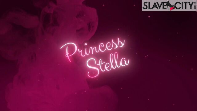 Blonde Princess Stella Is Sitting On a Large Bed And Showing Off a Huge Black Dildo