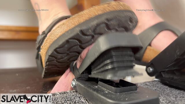 Watch As She Is Tormenting His Balls Using Her Designer Sandals