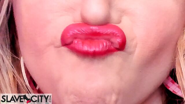 Blonde Paints Her Lips With Different Lipsticks And Sniffs Them With Her Nose