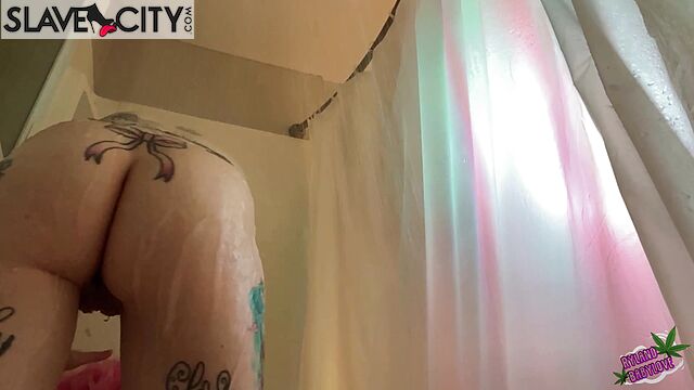 Short-haired Girl Shakes Her Ass In The Shower And Shows Her Hairy Pussy