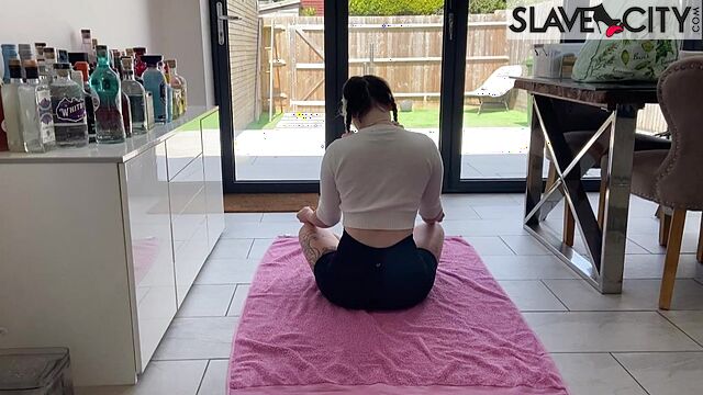 A Brunette With Pigtails Performs A Couple Of Indian Yoga Exercises