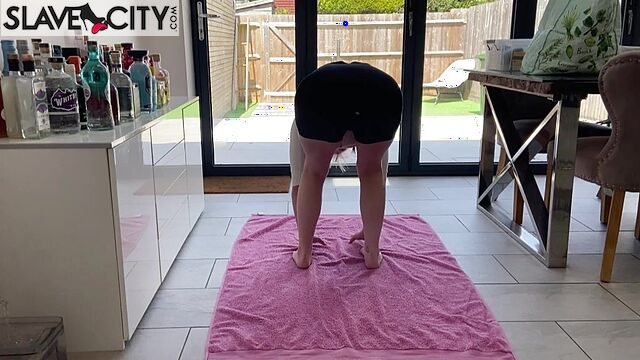 A Brunette With Pigtails Performs A Couple Of Indian Yoga Exercises