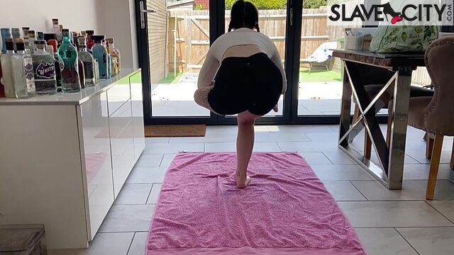 A Brunette With Pigtails Performs A Couple Of Indian Yoga Exercises
